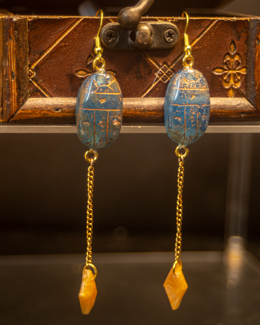 Hathor Sky - Scarab earrings in blue resin with golden highlights